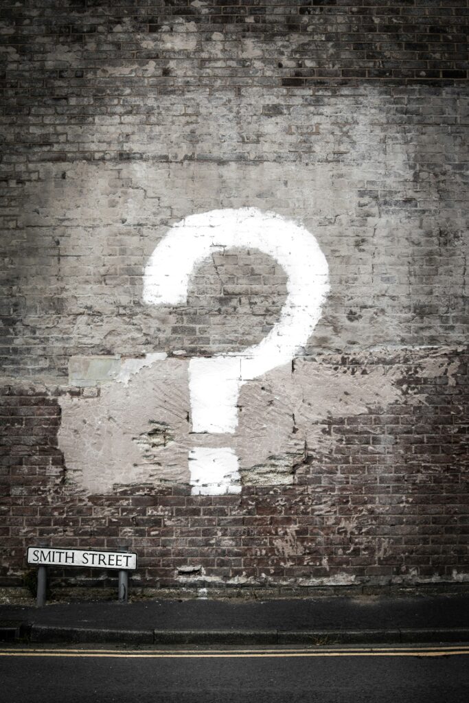 A question mark painted on a wall